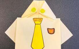 Na zdjęciu origami-koszule z życzeniami z okazji Dnia Ojca